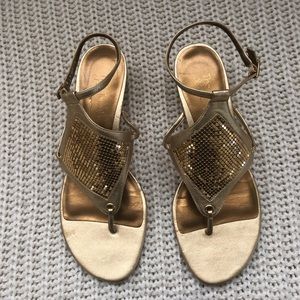 The touch of Nina Gold sandals used only once